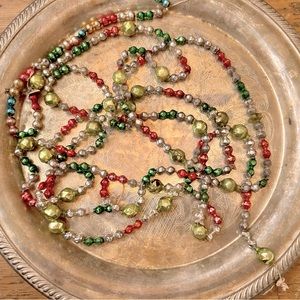 Vintage 8’ 6” long Mercury glass beads. Some damage due to age.